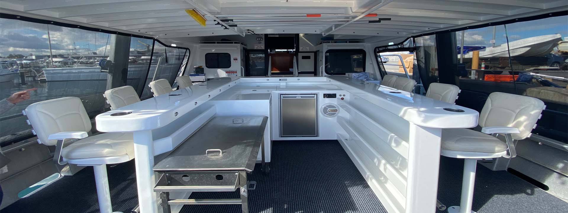 https://www.kimberleyboatcruises.com.au/wp-content/uploads/2020/09/TWO-SEAS-back-deck-panorama-photo-image.jpg