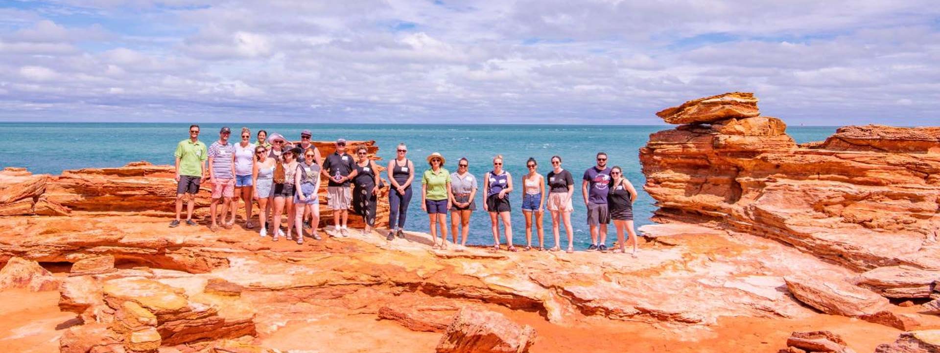 BROOME-TOWN-MORNING-TOURS-group-photo-on-rocks