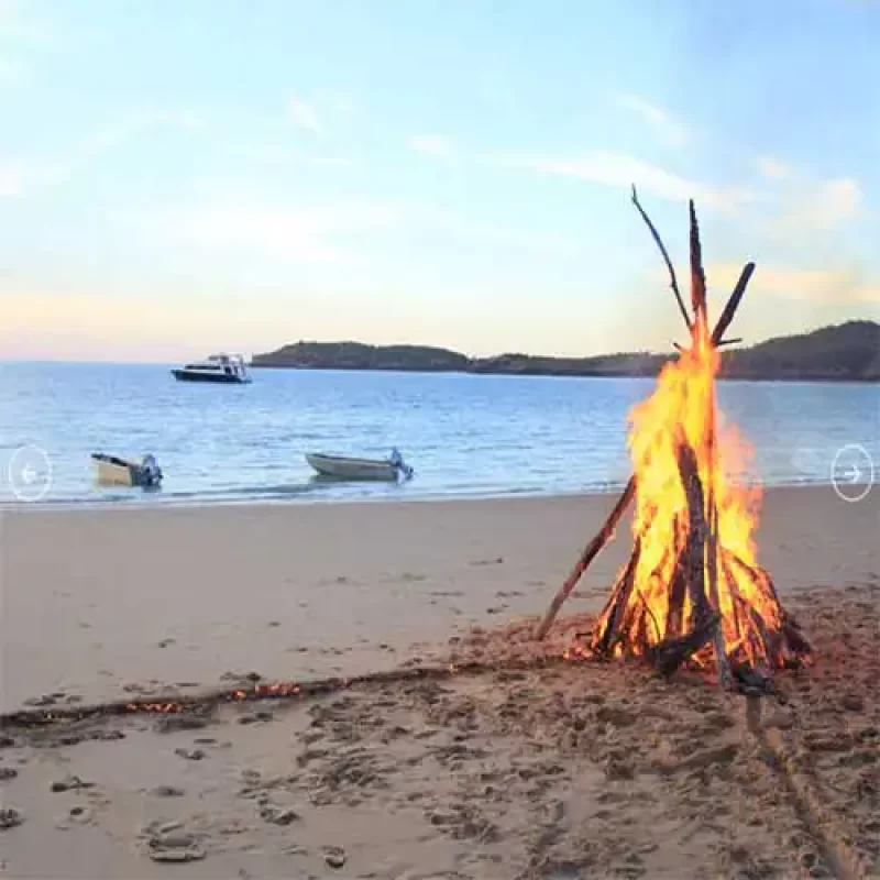 LADY-M-itineraries-beach-fire LADY-M-itineraries-beach-fire