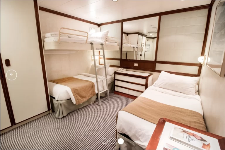 PACIFIC EXPLORER interior room cabin single bed and double bunk
