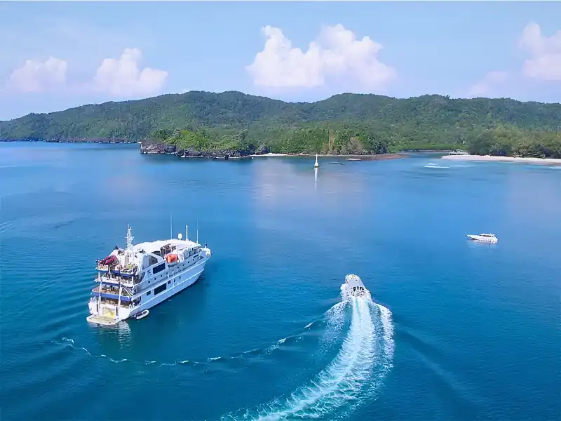 CORAL-DISCOVERER-SOLO-CRUISE-DEALS-2026-bay-tender-aerial