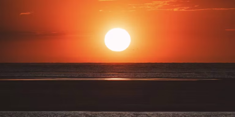 WILLIE CREEK GETAWAY sunset over ocean