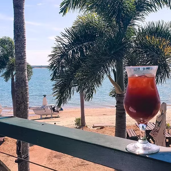 Cocktail on ledge heli pub tours