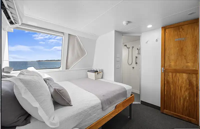 DIVERSITY II Flybridge bed to bathroom view DIVERSITY II Flybridge bed to bathroom view